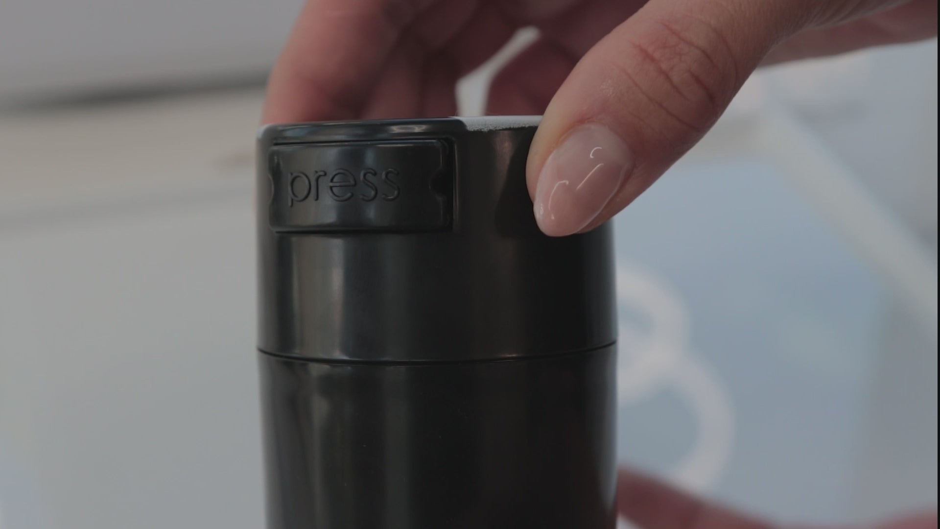 Instructional video on how to open and close storage container