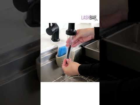 Instructional video on using barbicide container for sterilizing and sanitizing tools after appointments.